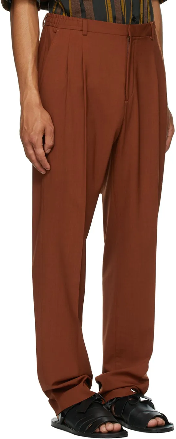 CMMN SWDN Orange Wool Jez Pleated Trousers
